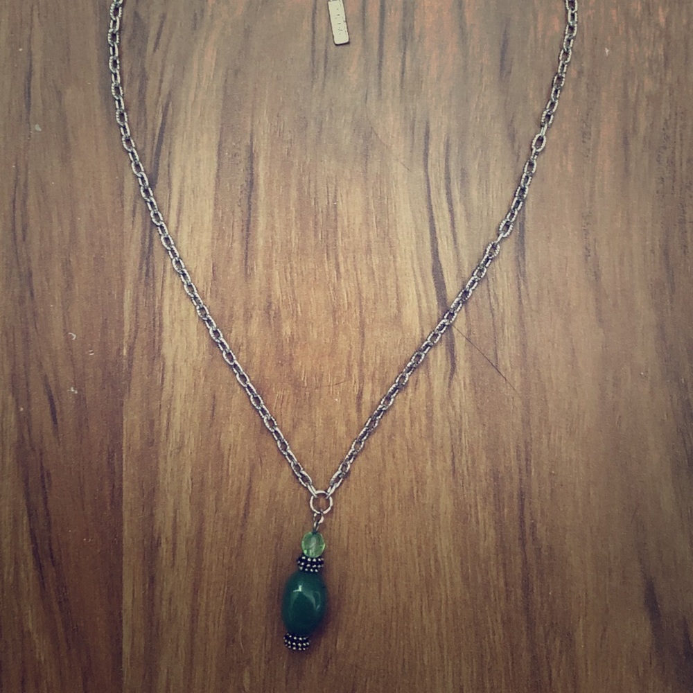 Stifling Silver necklace with green pendant.